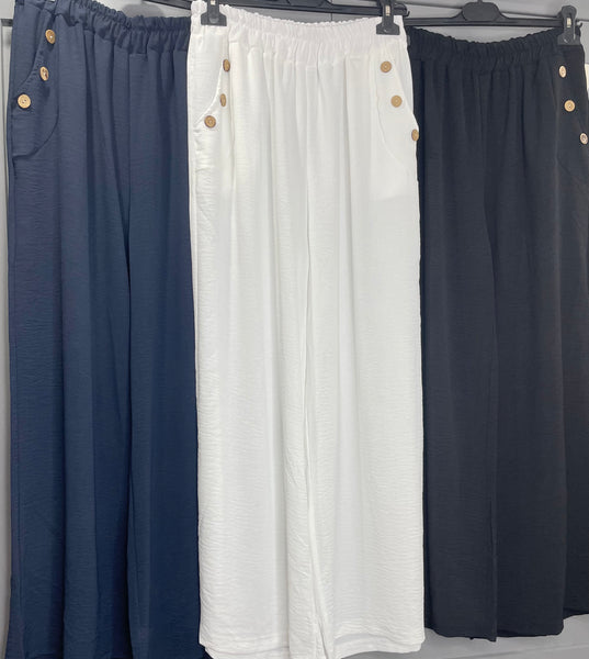 Wide leg three button pocket trousers