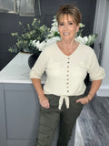 Cream V neck tie top