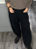 Black tulip shape needle cord joggers