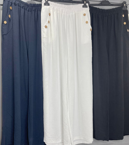 Wide leg three button pocket trousers