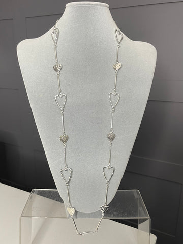 Long multi heart necklace in silver tone