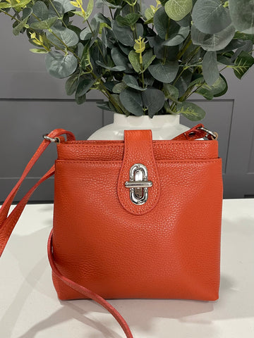 Orange Italian soft leather crossbody bag with twist lock