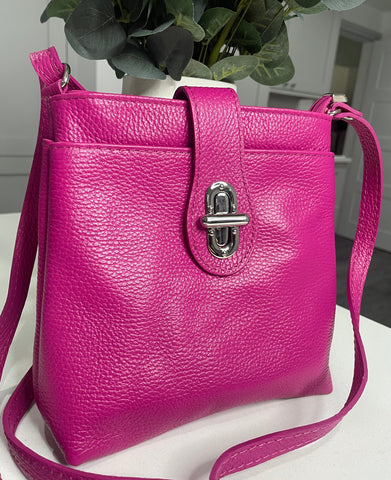 Fuchsia pink soft Italian leather crossbody , twist lock bag