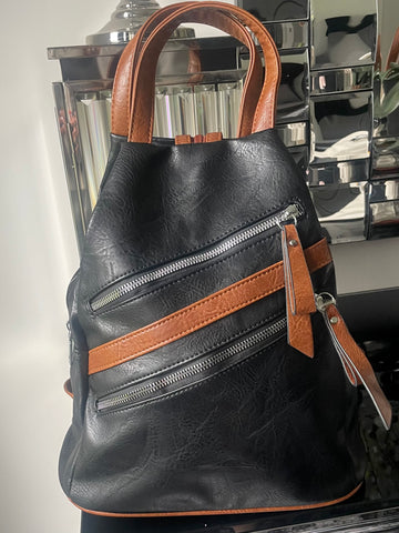 Black triangular back pack bag