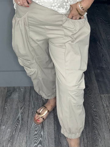 Beige utility pocket cuffed trousers
