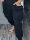 Black utility pocket cuffed trousers