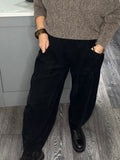 Black tulip shape needle cord joggers