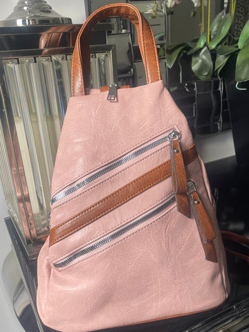 Pink triangular back pack bag